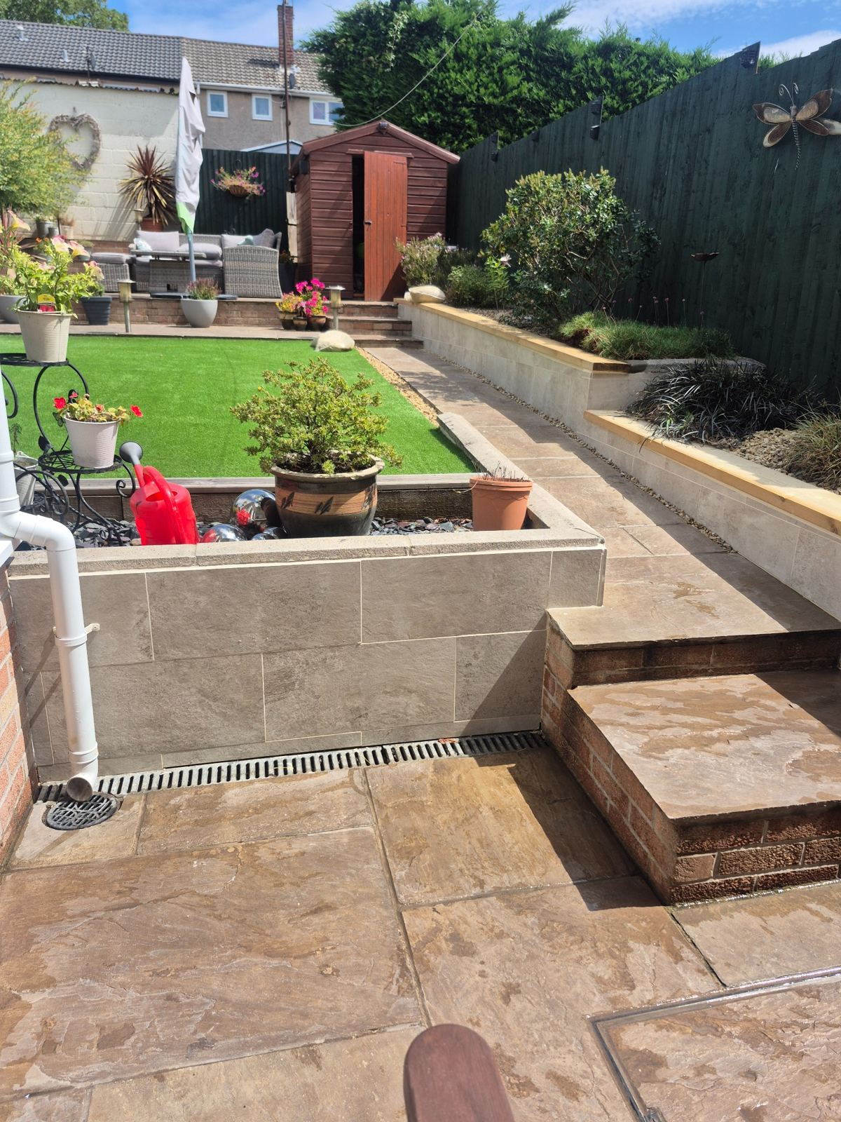 Exterior wall tiling and treated timber capping